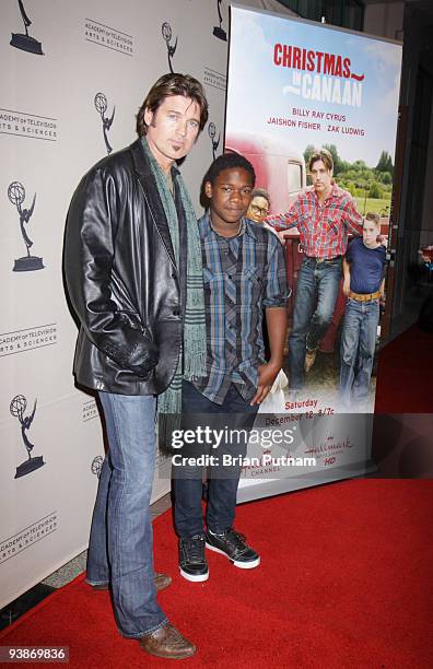 Actors Billy Ray Cyrus and Jaishon Fisher attend a sneak preview of Hallmark Channel's "Christmas in Canaan" at Leonard H. Goldenson Theatre on...