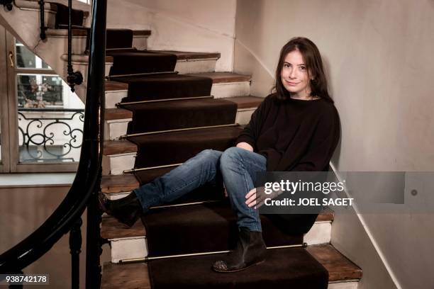 French writer Anne Goscinny poses during a photo session in Paris on March 26, 2018. / AFP PHOTO / JOEL SAGET