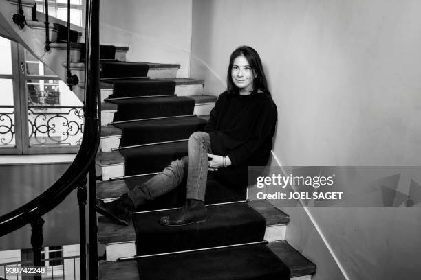 French writer Anne Goscinny poses during a photo session in Paris on March 26, 2018. / AFP PHOTO / JOEL SAGET