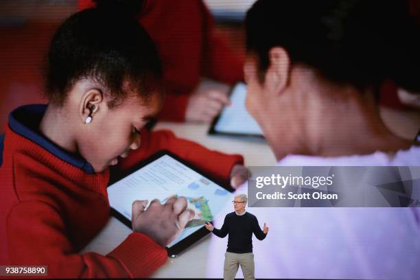 Apple CEO Tim Cook introduces Apple's new iPad during an event at Lane Tech College Prep High School on March 27, 2018 in Chicago, Illinois. The...