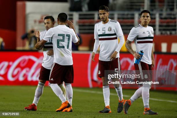 Marco Fabian, Jesus Gallardo, Diego Reyes and Carlos Salcedo of Mexico celebrate a goal against Iceland during their match at Levi's Stadium on March...