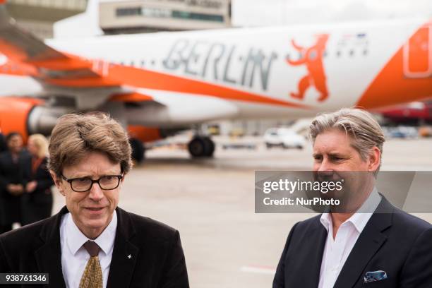 Easyjet-CEO Johan Lundgren and Chief of Berlin-Brandenburg Airport society Engelbert Luetke Daldrup speak to the media in front of an easyJet plane...