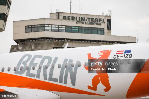 An easyJet plane carrying a Berlin design arrives at Tegel airport in Berlin, Germany on March 27, 2018. The airline presented today the summer...