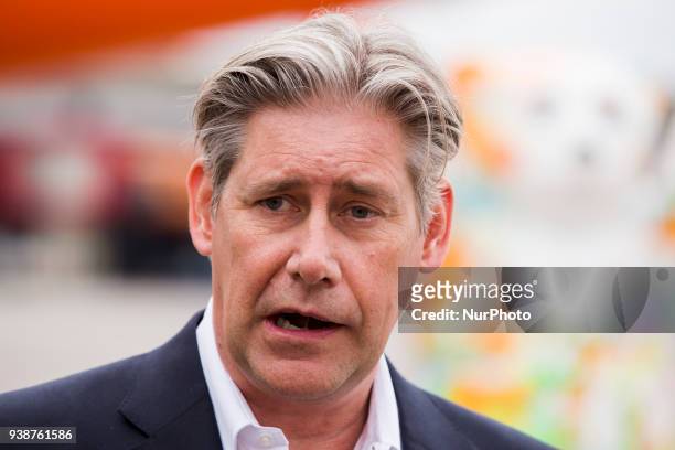 Easyjet-CEO Johan Lundgren is pictured in front of an easyJet plane carrying a Berlin design at Tegel airport in Berlin, Germany on March 27, 2018....