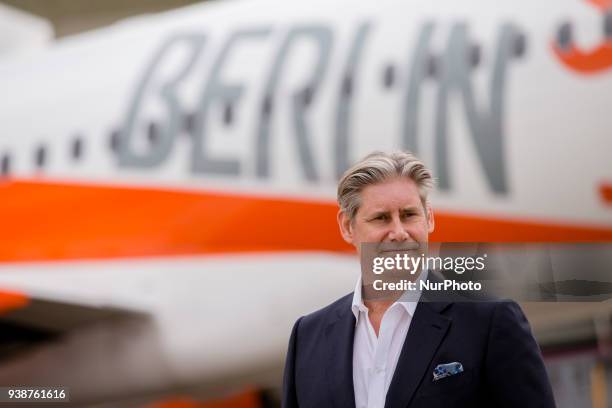Easyjet-CEO Johan Lundgren is pictured in front of an easyJet plane carrying a Berlin design at Tegel airport in Berlin, Germany on March 27, 2018....
