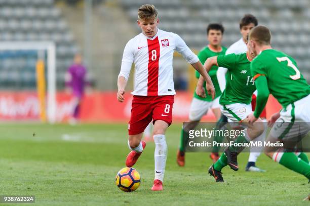 Mateusz Bogusz of Poland passes the ball during UEFA Under-17 Championship Elite Round Group 3 match between Poland and Republic of Ireland on March...