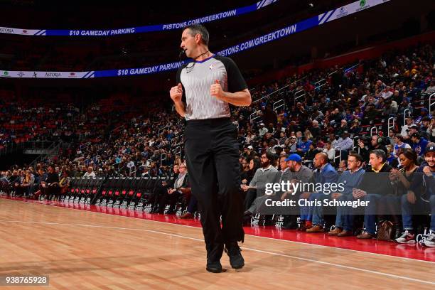 Referee, Brett Nansel runs up court during the Los Angeles Lakers game against the Detroit Pistons on March 26, 2018 at Little Caesars Arena in...