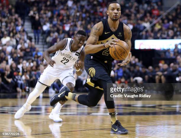 Norman Powell of the Toronto Raptors dribbles the ball during the first half of an NBA game against the Brooklyn Nets at Air Canada Centre on March...