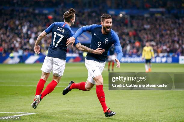 Olivier Giroud of France celebrates his goal with Lucas Digne during the international friendly match between France and Colombia at Stade de France...