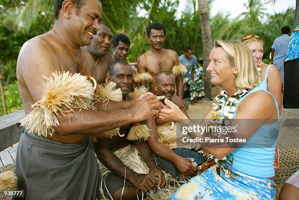 Reining Association of Surfing Professionals world champion Layne Beachley of Sydney, Australia takes part in a Kava ceremony for the Roxy Pro on...