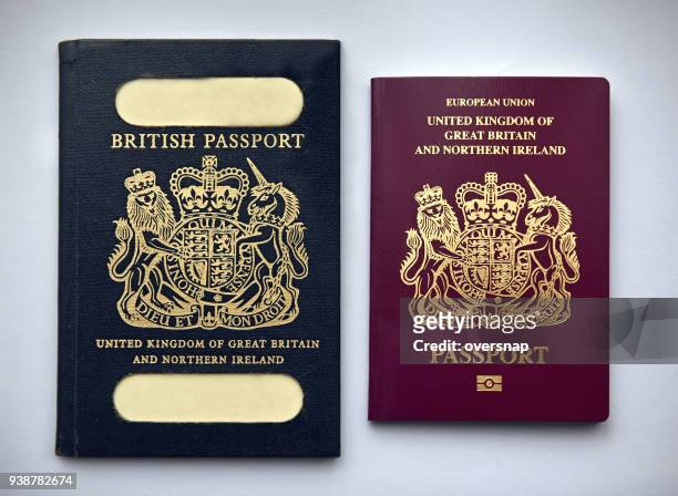 uk passports vintage and current - british culture stock pictures, royalty-free photos & images