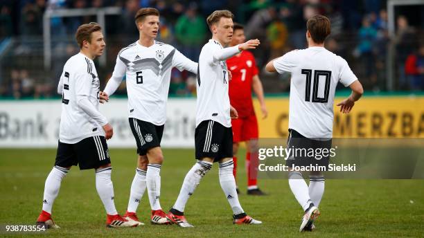 Felix Passlack, Dzenis Burnic, Robin Hack and Patrick Kammerbauer of Germany celebration the Goal 1:0 during the international friendly match between...