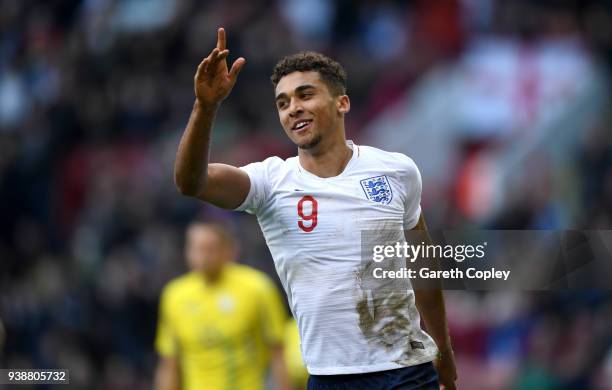 Dominic Calvert-Lewin of England celebrates scoring the opening goal past Andriy Lunin of Ukraine during the U21 European Championship Qualifier...