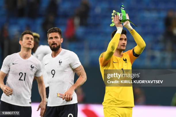 France's goalkeeper Hugo Lloris thanks supporters after an international friendly football match between Russia and France at the Saint Petersburg...