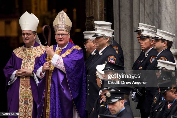Archbishop of New York Cardinal Timothy Dolan looks on during the funeral for New York City firefighter Lt. Michael Davidson at St. Patrick's...