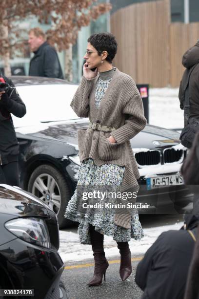 Vice president of style and creative at Farfetch Yasmin Sewell wears a Chloe dress, Yeezy boots and a Balenciaga cardigan day 4 of Paris Womens...