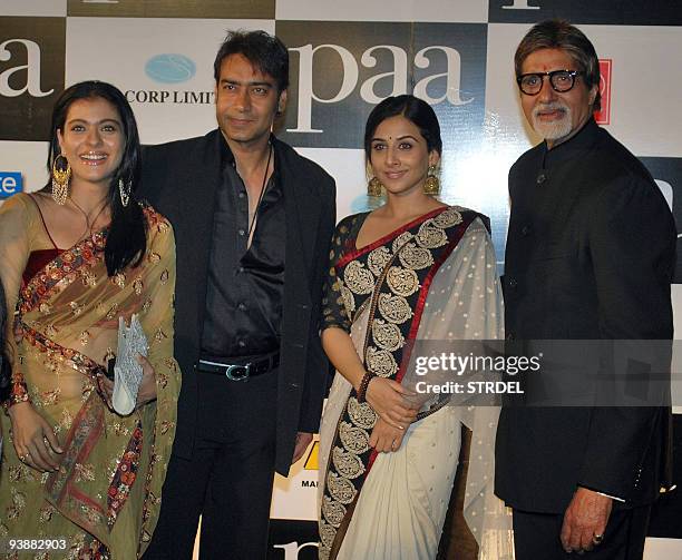 Indian actor Amitabh Bachchan poses with fellow thespians Kajol, Ajay Devgan and Vidya Balan at the premiere of the Bollywood Hindi film �Paa� in...