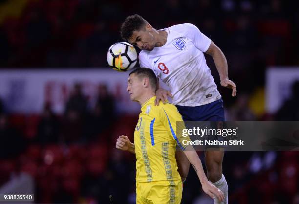 Dominic Calvert-Lewin of England U21 and Ivan Zotko of Ukraine U21 in action during the U21 European Championship Qualifier match between England U21...