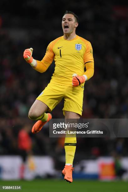 Jack Butland of England celebrates after his sides first goal during the International friendly between England and Italy at Wembley Stadium on March...