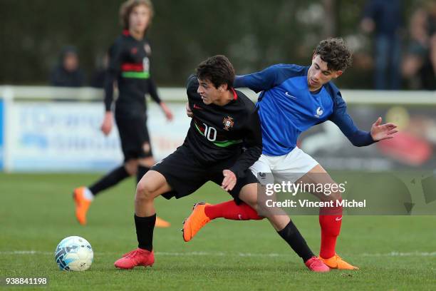 Paulo Bernardo of Portugal and Adil Aouchiche of France during the Mondial Montaigu match between France U16 and Portugal U16 on March 27, 2018 in...