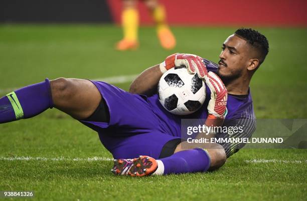 Saudi Arabia's goalkeeper Fawaz Al-Qarni catches the ball during a friendly international match between Belgium and Saudi Arabia at the King Baudouin...