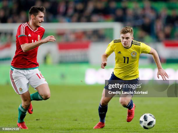 Adam Pinter of Hungary and James Forrest of Scotland in action during the International Friendly match between Hungary and Scotland at Groupama Arena...