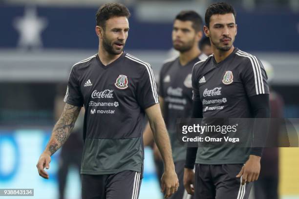 Miguel Layun and Oswaldo Alanis of Mexico look on during the Mexico training session ahead of the FIFA friendly match against Croatia at AT&T Stadium...