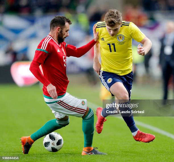 Attila Fiola of Hungary and James Forrest of Scotland in action during the International Friendly match between Hungary and Scotland at Groupama...