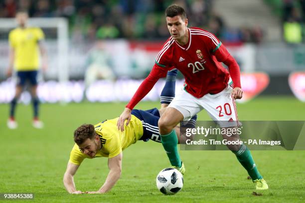 Hungary's Richard Guzmics and Scotland's Ryan Fraser battle for the ball during the international friendly match at the Groupama Arena, Budapest.
