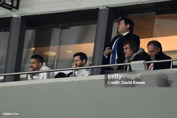 Lionel Messi of Argentina and Manuel Lanzini of Argentina watch from the stands during the International Friendly between Spain and Argentina on...