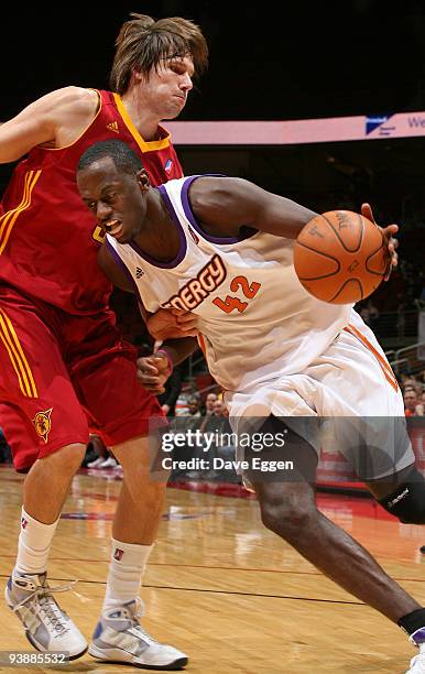 Earl Barron of Iowa drives into the defense of Sean Sonderleiter of Fort Wayne in the second half of their NBA D-League game December 3, 2009 at the...