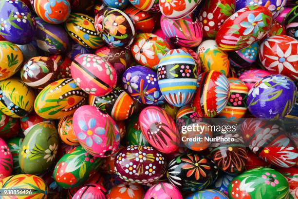 Hand made traditional hand painted Easter eggs and baskets on display for sale on Krakow's Easter market. Originating as a pagan tradition, pisanki...