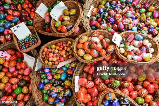 Hand made traditional hand painted Easter eggs and baskets on display for sale on Krakow's Easter market. Originating as a pagan tradition, pisanki...