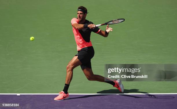 Juan Martin Del Potro of Argentina plays a forehand against Filip Krajinovic of Serbia in their fourth round match during the Miami Open Presented by...