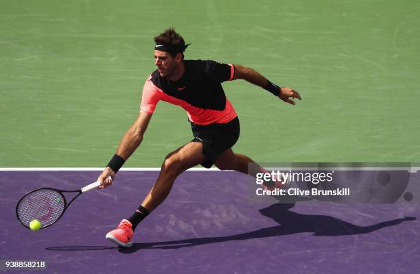 Juan Martin Del Potro of Argentina plays a forehand against Filip Krajinovic of Serbia in their fourth round match during the Miami Open Presented by...