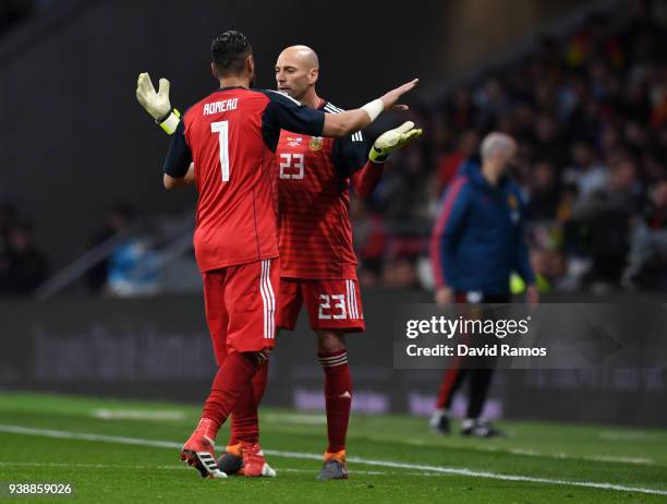 Sergio Romero of Argentina leaves the pitch due to injury, as Willy Caballero of Argentina comes on in replacement during the International Friendly...