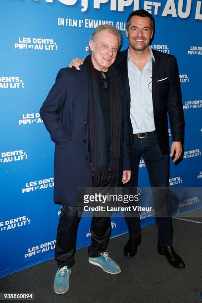 Singer Herbert Leonard and Actor Arnaud Ducret attend "Les Dents, Pipi et au Lit" Paris Premiere at UGC Cine Cite des Halles on March 27, 2018 in...