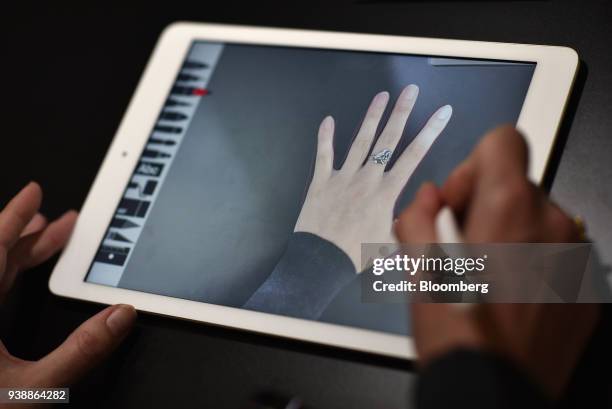 An attendee demonstrates a new Apple Inc. IPad and Apple Pencil in a technology lab during an event at Lane Technical College Prep High School in...