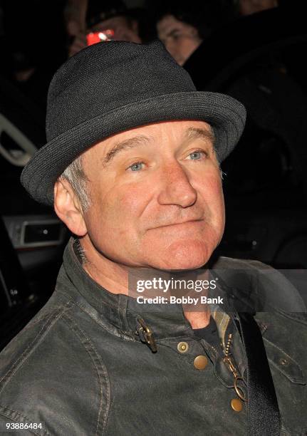 Robin Williams exits the stage doors of Town Hall from his "Weapons of Self Destruction" show on December 3, 2009 in New York City.