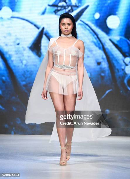 Model walks the runway wearing Evan Clayton at 2018 Vancouver Fashion Week - Day 6 on March 24, 2018 in Vancouver, Canada.