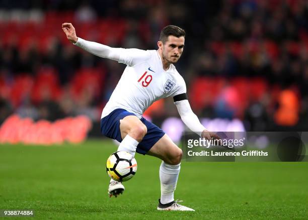 Lewis Cook of England controls the ball during the International friendly between England and Italy at Wembley Stadium on March 27, 2018 in London,...