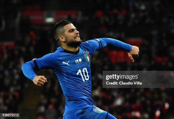 Italy's striker Lorenzo Insigne celebrates after scoring their first goal from the penalty spot during the International friendly football match...