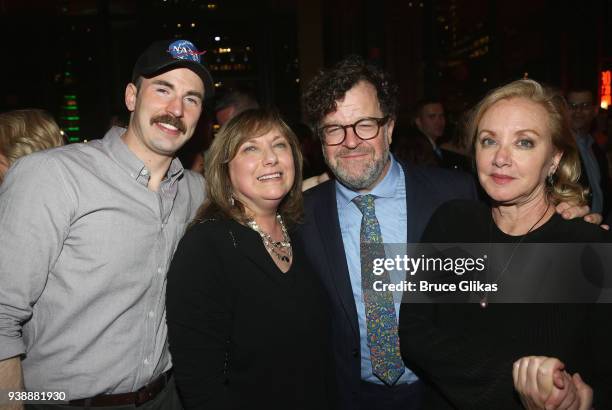 Chris Evans, mother Lisa Evans, Playwright Kenneth Lonergan and wife J Smith Cameron pose at the opening night after party for the play "Lobby Hero"...