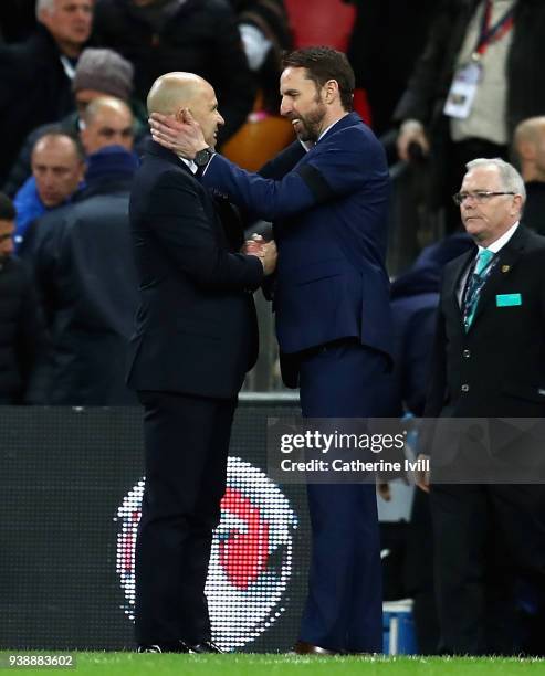 Luigi Di Biagio, Head coach of Italy and Gareth Southgate manager of England embrace after the International friendly between England and Italy at...