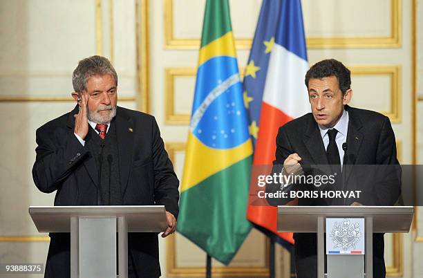 French President Nicolas Sarkozy and his Brazilian counterpart Luiz Inacio Lula da Silva give a press conference prior to a meeting on November 14,...