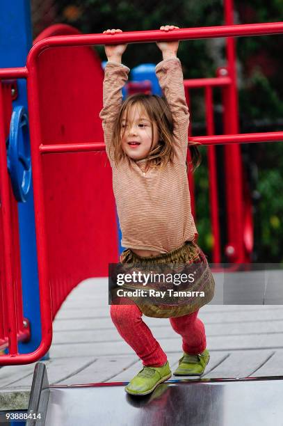 Ava Jackman plays in Greenwich Village with her father Hugh Jackman on December 03, 2009 in New York City.