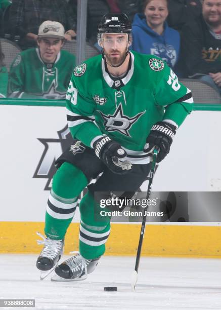 Greg Pateryn of the Dallas Stars handles the puck against the Vancouver Canucks at the American Airlines Center on March 25, 2018 in Dallas, Texas....