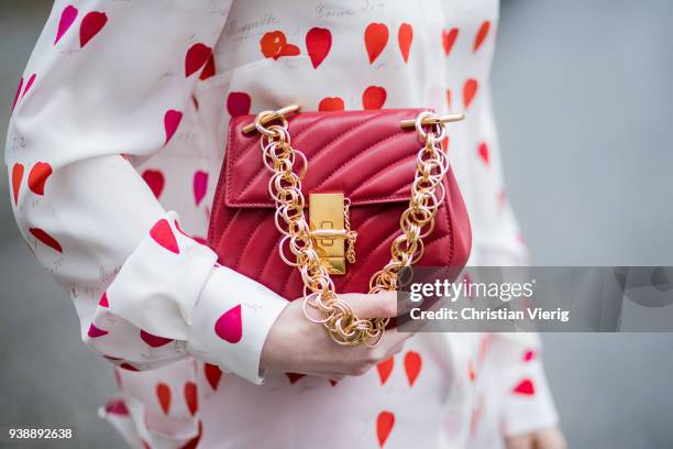 Maria Barteczko wearing white heart printed blouse Alexander McQueen, red cropped pants Alexander McQueen, white high heel sandals Giuseppe Zanotti,...