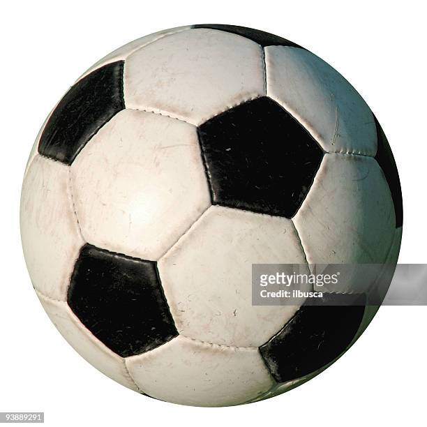 football-verwendet isoliert alten fußball ball auf weißem hintergrund - fußball spielball stock-fotos und bilder
