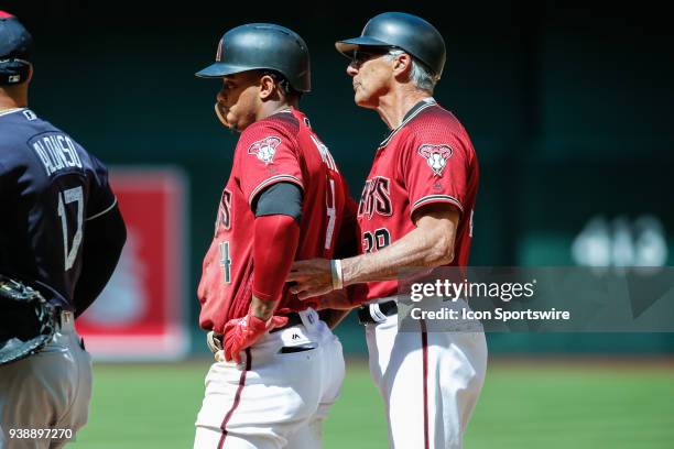 Arizona Diamondbacks first base coach Dave McKay talks to Arizona Diamondbacks shortstop Ketel Marte during the spring training MLB baseball game...